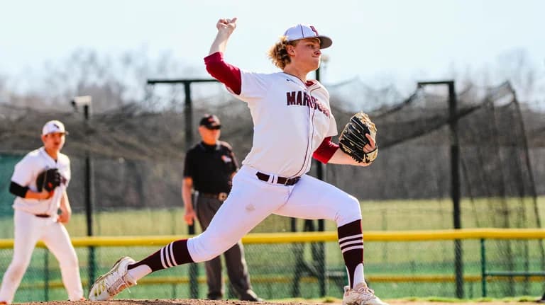 Baseball pitcher delivering a pitch