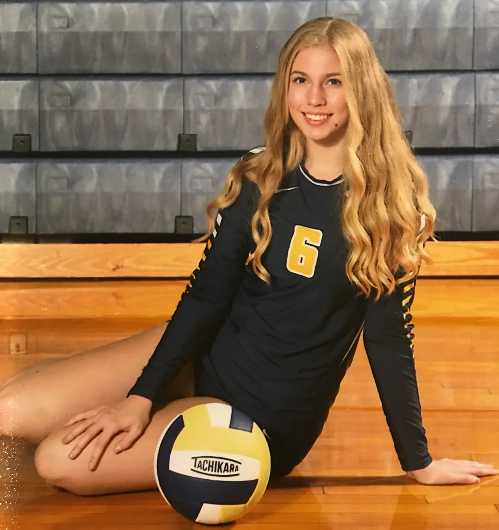 Volleyball athlete holding a volleyball